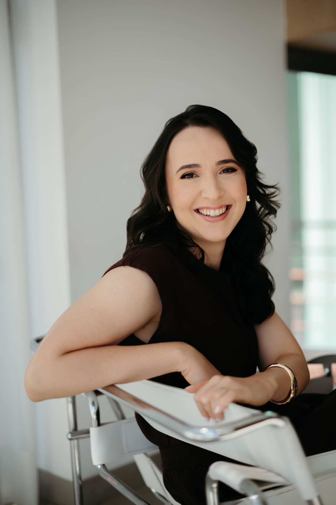 Dra. Carla Moura Fé Elias durante atendimento